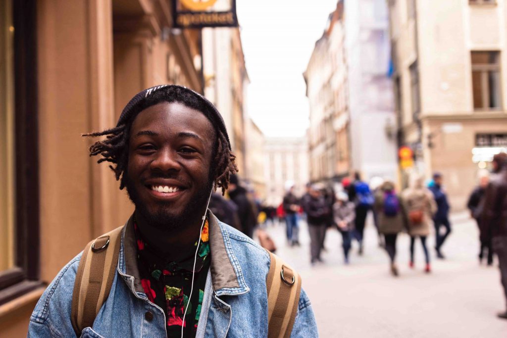 student walking while listening to music